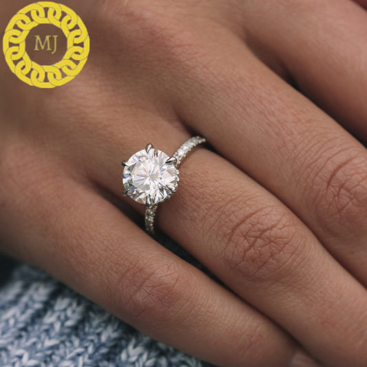 stunning 10mm Round cut Moissanite Diamond ring in 6 claw setting with a gorgeous wrap around Hidden Halo,finished by 2mm Pavé band