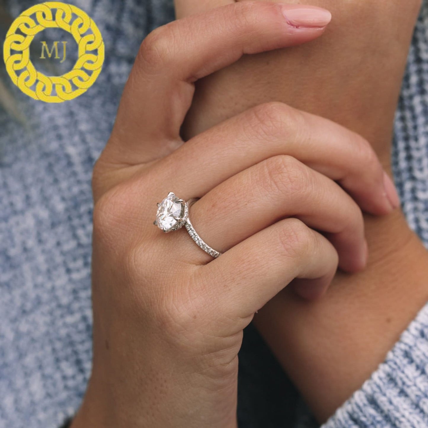 stunning 10mm Round cut Moissanite Diamond ring in 6 claw setting with a gorgeous wrap around Hidden Halo,finished by 2mm Pavé band